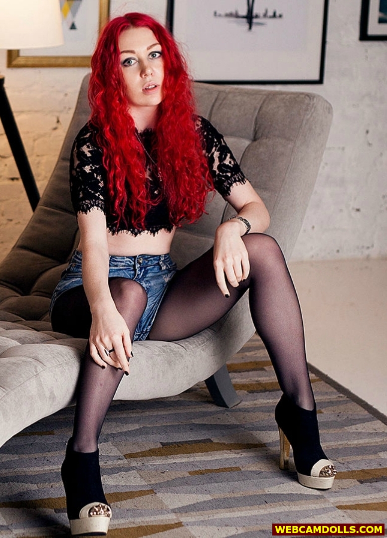 Redhead Girl in Black Sheer Pantyhose and Blue Denim Shorts on Webcamdolls
